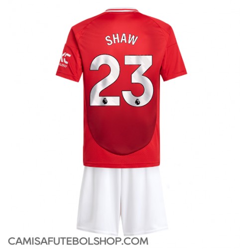 Camisa de time de futebol Manchester United Luke Shaw #23 Replicas 1º Equipamento Infantil 2024-25 Manga Curta (+ Calças curtas)